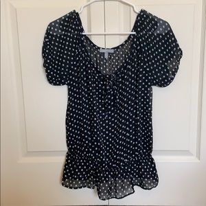 Black and white polka dot peplum top